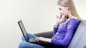 girl with laptop at home